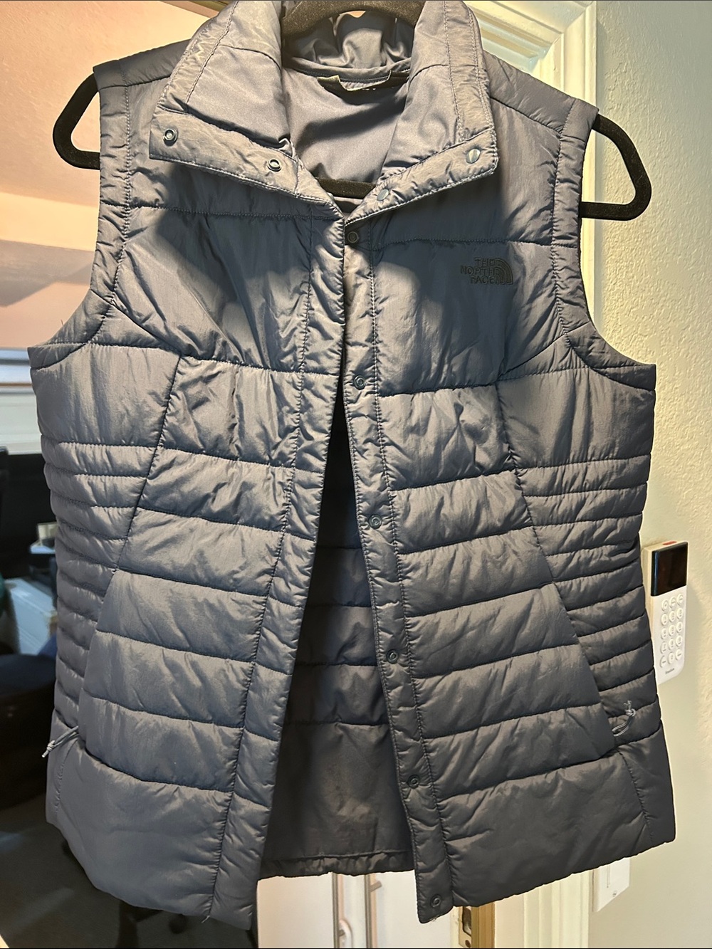 The North Face Quilted Puffer Vest in Navy Blue